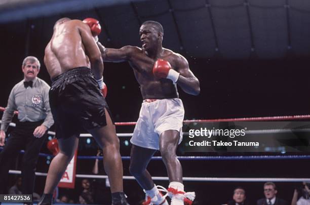 Boxing: WBC/WBA/IBF Heavyweight Title, James Buster Douglas in action, throwing punch vs Mike Tyson at Tokyo Dome, Tokyo, Japan 2/11/1990
