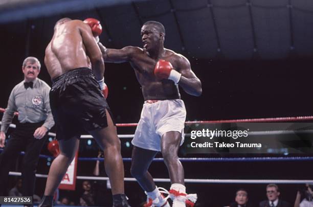 Boxing: WBC/WBA/IBF Heavyweight Title, James Buster Douglas in action, throwing punch vs Mike Tyson at Tokyo Dome, Tokyo, Japan 2/11/1990