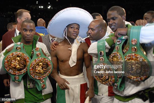 Boxing: WBC Super Welterweight, Floyd Mayweather Jr, victorious with trophy belt and wearing sombrero after winning fight by split decision vs Oscar...