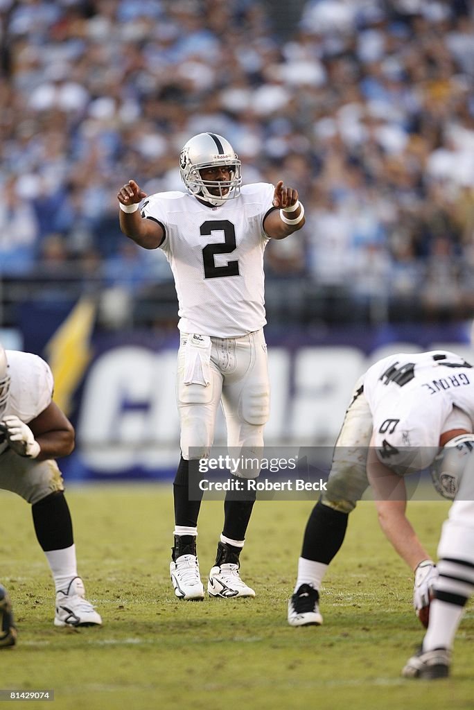 Oakland Raiders QB Aaron Brooks calling signals before snap during