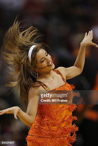 Basketball: Closeup of Miami Heat Dance Team cheerleader during game vs Cleveland Cavaliers, Miami, FL 3/12/2006