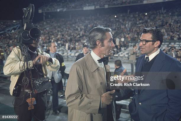 College Football: Sugar Bowl, Penn State coach Joe Paterno on sidelines with ABC Sports media announcer Chris Schenkel before game vs Oklahoma, New...