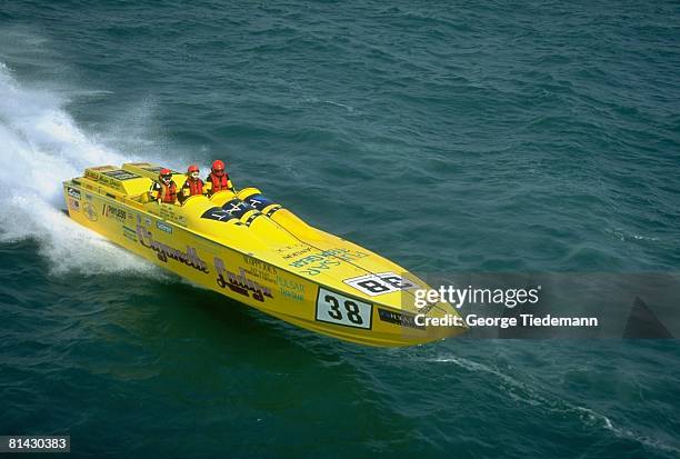 Boating: Aerial view of Anna Dalva and Morris Dalva in action on Cigarette Lady II, speed boat, Key West, FL