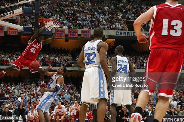 College Basketball: NCAA playoffs, Wisconsin Alando Tucker in action, making dunk vs North Carolina Sean May , Syracuse, NY 3/27/2005