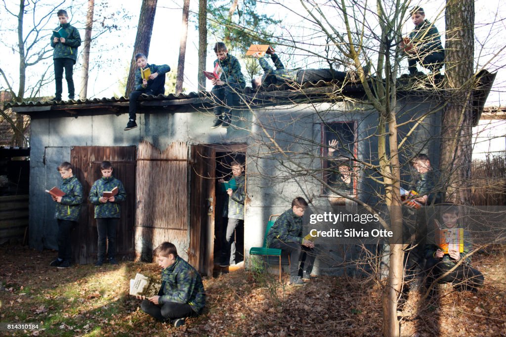 Multiple Exposures of Teenager in reading different books in forest