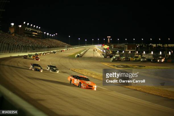 Auto Racing: NASCAR Ford 400, Tony Stewart in action, becoming Nextel Cup champion at Miami Speedway, Homestead, FL