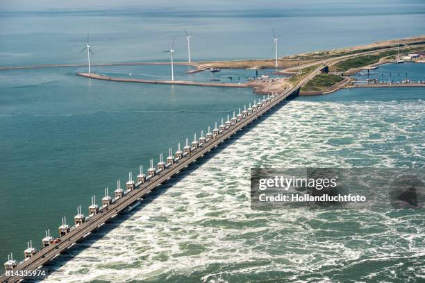 the eastern scheldt storm surge barrier designed to protect the netherlands from flooding - zeeland 個照片及圖片檔