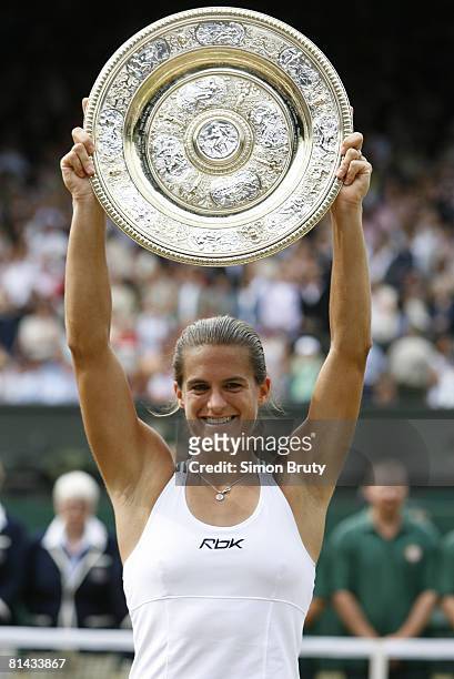 Tennis: Wimbledon, Closeup of France Amelie Mauresmo victorious with Rosewater Dish trophy after winning Finals vs Belgium Justine Henin-Hardenne at...