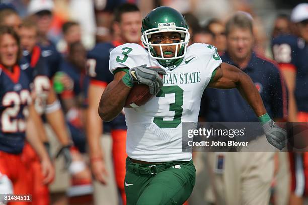 College Football: Closeup of Michigan State Kyle Brown in action, rushing vs Illinois, Champaign, IL 9/24/2005