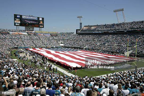 Football: View of large USA flag on field of Alltel Stadium during National Anthem before Jacksonville Jaguars vs Seattle Seahawks game,...