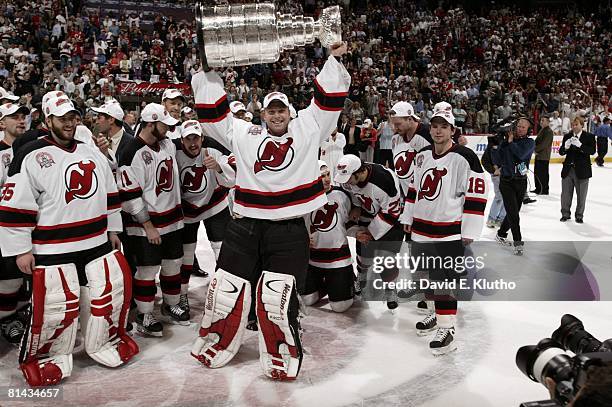 Hockey: NHL Finals, New Jersey Devils goalie Martin Brodeur victorious with Stanley Cup Trophy after winning Game 7 vs Anaheim Mighty Ducks, East...