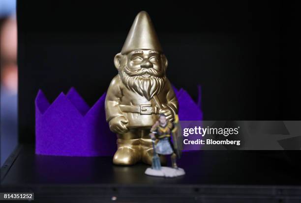 Golden gnome trophy sits on a shelf at Jagex Ltd. Games Studio's offices in Cambridge, U.K., on Monday, March 20, 2017. Last year Zhongji Enterprise...