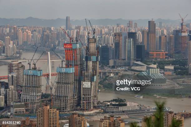 Eight towers of Raffles City Chongqing are roofed on July 13, 2017 in Chongqing, China. Singapore property giant CapitaLand put down a $4 billion...