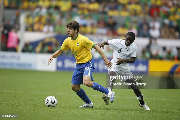 Soccer: World Cup, Brazil Juninho Pernambucano in action vs Ghana Emmanuel Pappoe , Round of 16, Dortmund, Germany 6/27/2006