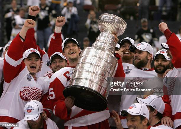 Nicklas Lidstrom and the Detroit Red Wings celebrate with the Stanley Cup after defeating the Pittsburgh Penguins in game six of the 2008 NHL Stanley...