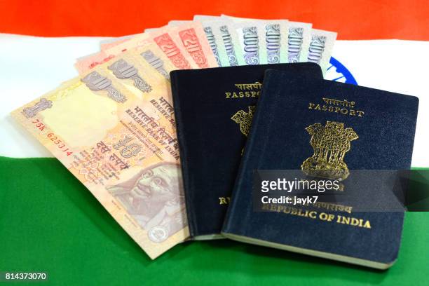india passport and currency - indian rupee note stock pictures, royalty-free photos & images