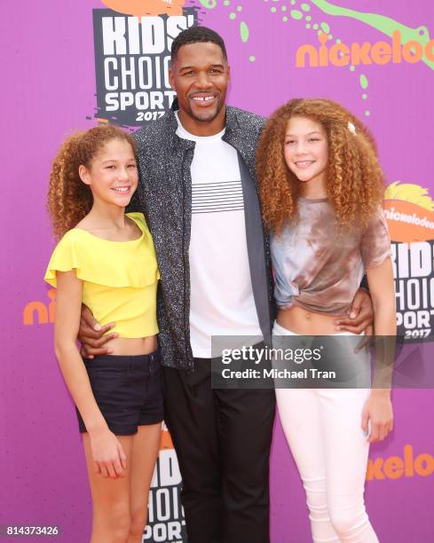 Michael Strahan with his daughters, Sophia Strahan and Isabella Strahan arrive at Nickelodeon Kids' Choice Sports Awards 2017 held at Pauley Pavilion...