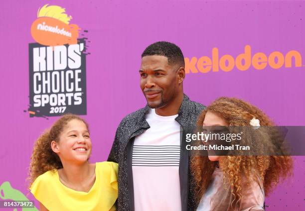 Michael Strahan with his daughters, Sophia Strahan and Isabella Strahan arrive at Nickelodeon Kids' Choice Sports Awards 2017 held at Pauley Pavilion...