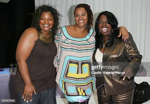 Actress Mo'Nique Singers, Jill Scott and Angie Stone attends "Jill Scott Shares butterfly Bra With The World" Event at Ashley Stewart store on June...