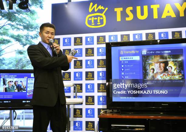 Ken Watanabe, president of Tsutaya TV, subsidiary of Japan's CD and video rental operator Tsutaya, announces the launch of broadband movie...