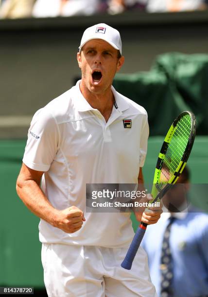 Sam Querrey of The United States celebrates winning the first set during the Gentlemen's Singles semi final match against Marin Cilic of Croatia on...