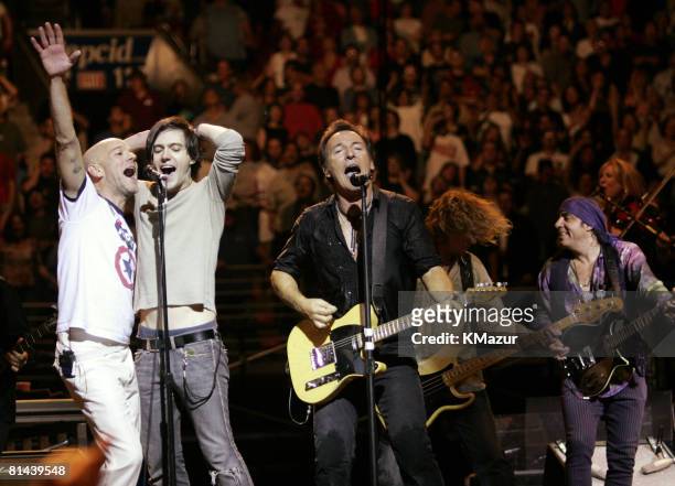Michael Stipe of REM wearing a "Kerry" shirt, Conor Oberst of Bright Eyes, Bruce Springsteen, Mike Mills of REM and Steven van Zandt