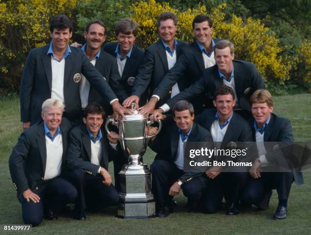 The American team with the trophy after winning the Walker Cup golf tournament held at Sunningdale, England on the 27th May 1987. The USA defeated...