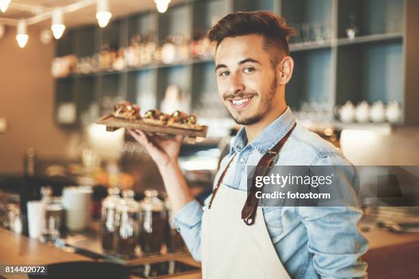 waiter serving healthy snack - waiting tables stock pictures, royalty-free photos & images