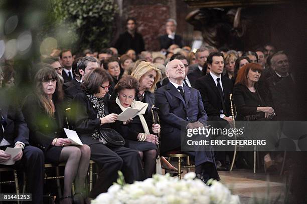 Pierre Berge , partner of fashion designer Yves Saint-Laurent, and French actress Catherine Deneuve attend Yves Saint-Laurent's funeral mass held by...