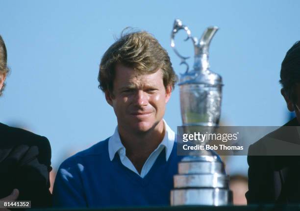 American golfer Tom Watson looking at the trophy after winning the British Open Golf Championship held at Royal Troon, Scotland during July 1982.