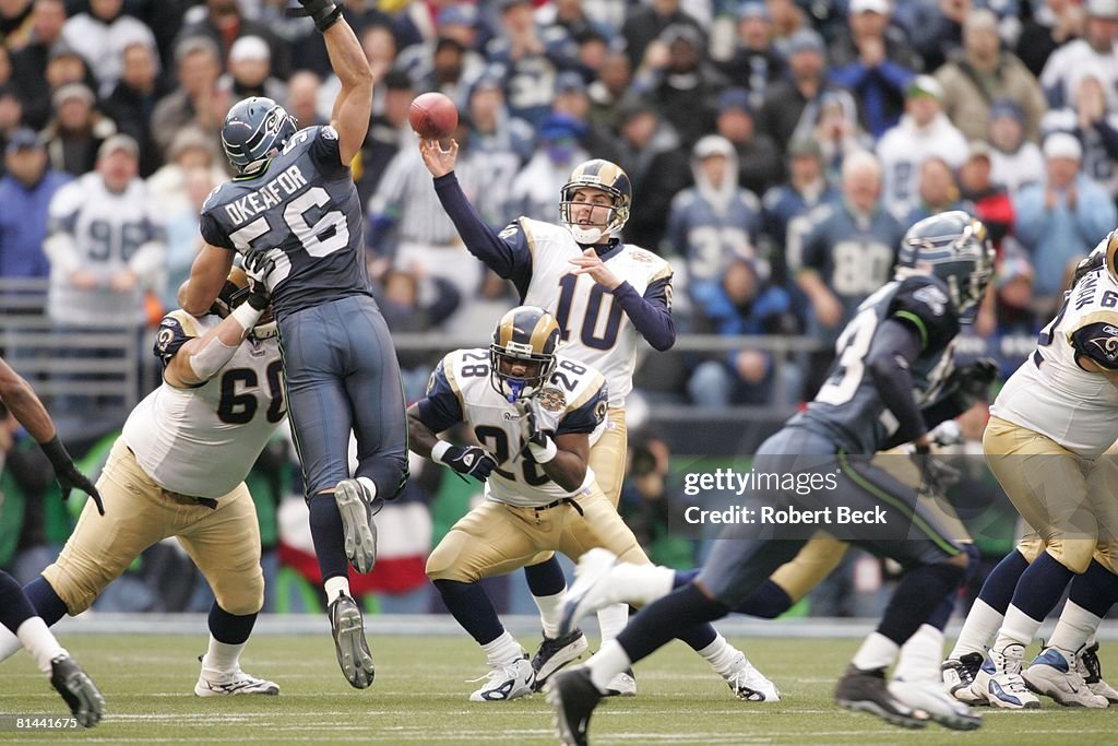 NFC playoffs, St, Louis Rams QB Marc Bulger in action, making pass vs ...
