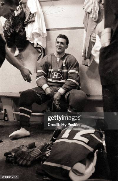 Hockey: Maurice "Rocket" Richard of the Montreal Canadiens sits in the locker room after scoring his 500th career goal during game against the...