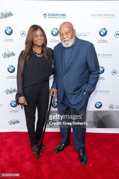 Cleveland Browns Full Back, NFL Champion and Actor Jim Brown and Wife Monique attends the Sports Academy Foundation 50 For 50 at Manhattan Country...