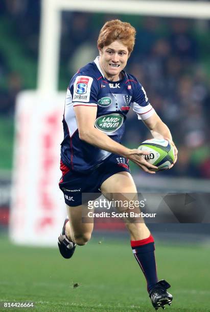 Nic Stirzaker of the Rebels runs with the ball during the round 17 Super Rugby match between the Melbourne Rebels and the Jaguares at AAMI Park on...