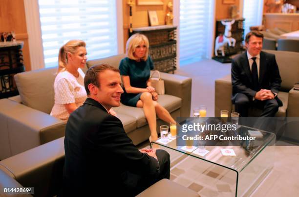 French President Emmanuel Macron poses with his wife Brigitte , Nice mayor Christian Estrosi and his pregnant wife Laura Tenoudji after arriving in...