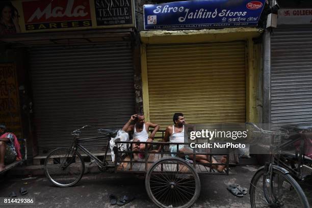 Cycle van Labor waiting for customer at Kolkata Barabazar area Textile wholesale market on July 14,2017 in India. Textile traders in West Bengals...