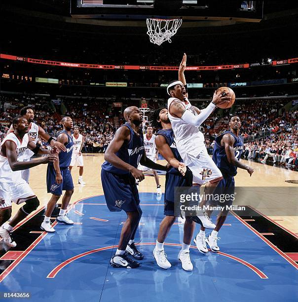 Basketball: Philadelphia 76ers Allen Iverson in action vs Washington Wizards Etan Thomas and Brendan Haywood during preseason, Philadelphia, PA