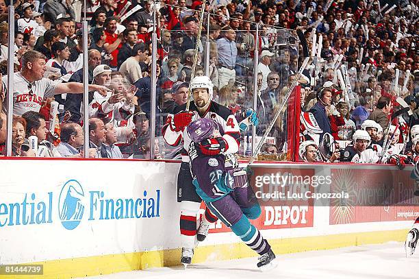 Hockey: Stanley Cup finals, New Jersey Devils Scott Stevens in action vs Anaheim Mighty Ducks Samuel Pahlsson , East Rutherford, NJ 5/29/2003