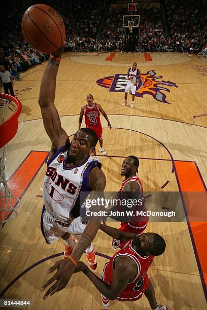 Basketball: Aerial view of Phoenix Suns Amare Stoudemire in action, making dunk vs Chicago Bulls, Phoenix, AZ 2/11/2007