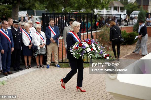 Marine Le Pen attends France Bastille Day official ceremony on July 14, 2017 in Henin-Beaumont, France. The French today celebrate Bastille Day, a...