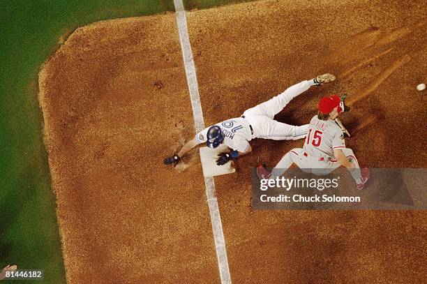 Baseball: World Series, Aerial view of Toronto Blue Jays Paul Molitor in action vs Philadelphia Phillies Dave Hollins , Toronto, CAN