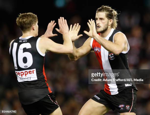 Josh Bruce of the Saints celebrates a goal with Jack Newnes of the Saints during the 2017 AFL round 17 match between the St Kilda Saints and the...