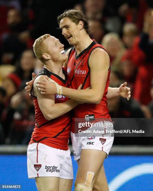 Joe Daniher of the Bombers celebrates a goal withh Josh Green of the Bombers during the 2017 AFL round 17 match between the St Kilda Saints and the...