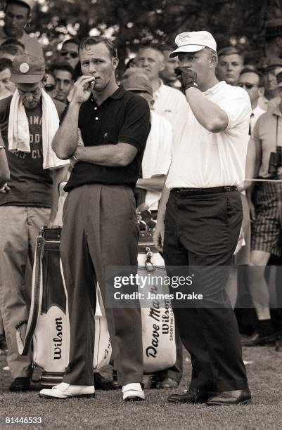 Golf: PGA Championship, Arnold Palmer and Jack Nicklaus smoking cigarette during play at Aronimink GC, Newton Square, PA 7/20/1962