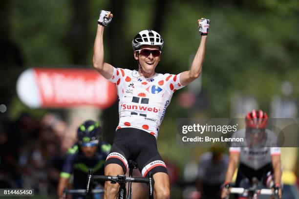 Warren Barguil of France riding for Team Sunweb celebrates crossing the line in 1st place during stage 13 of the Le Tour de France 2017, a 101km...