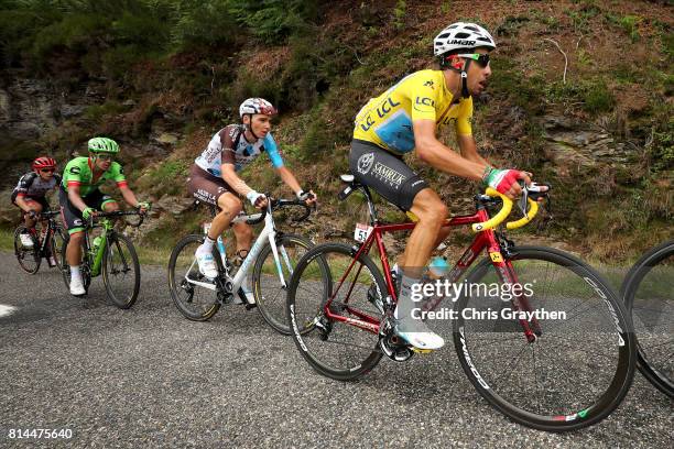 Fabio Aru of Italy riding for Astana Pro Team in the leader's jersey leads Romain Bardet of France riding for AG2R La Mondiale and Rigoberto Uran of...