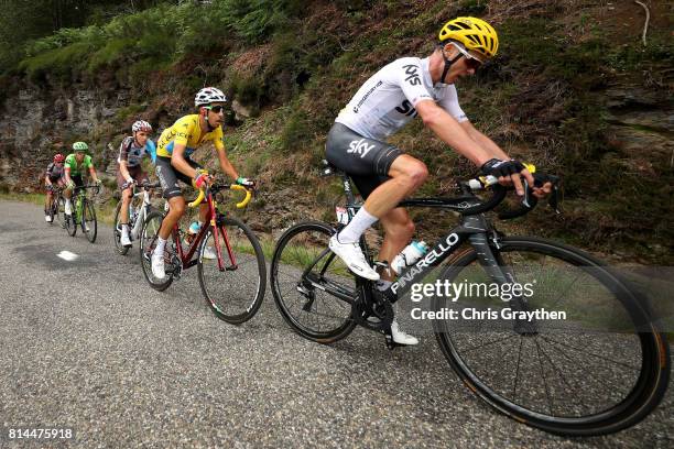 Christopher Froome of Great Britain riding for Team Sky leads Fabio Aru of Italy riding for Astana Pro Team in the leader's jersey, Romain Bardet of...