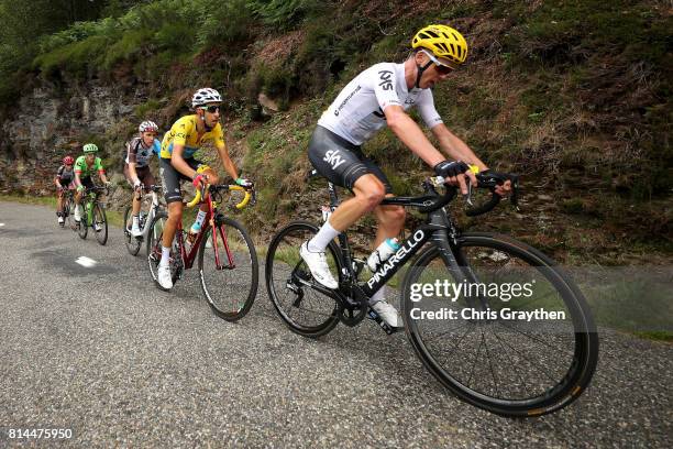 Christopher Froome of Great Britain riding for Team Sky leads Fabio Aru of Italy riding for Astana Pro Team in the leader's jersey, Romain Bardet of...