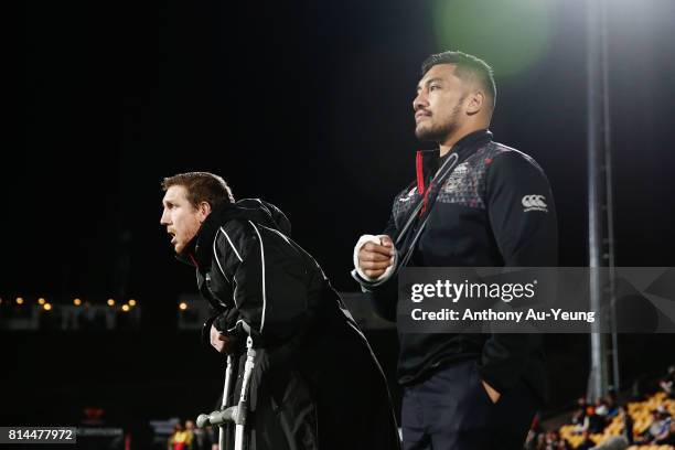 Injured players Ryan Hoffman and Albert Vete of the Warriors look on prior to the round 19 NRL match between the New Zealand Warriors and the Penrith...