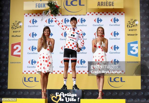 Warren Barguil of France riding for Team Sunweb celebrates winning the stage and retaining the Polka-Dot jersey after stage 13 of the Le Tour de...